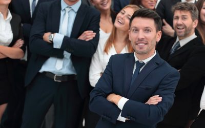 leader standing in front of a large business team. the business concept.
